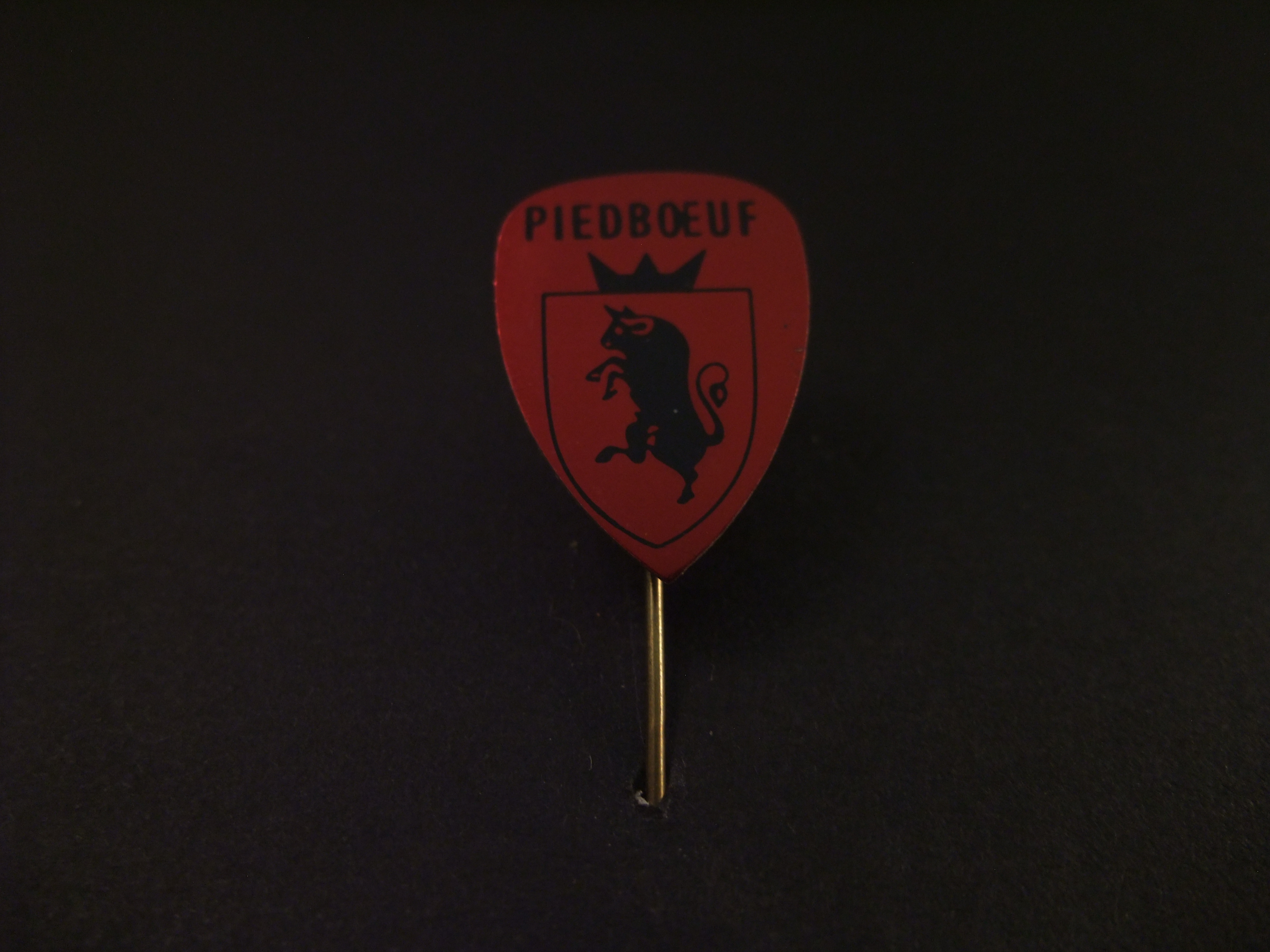 Piedboeuf Belgisch merk van tafelbieren, logo rood